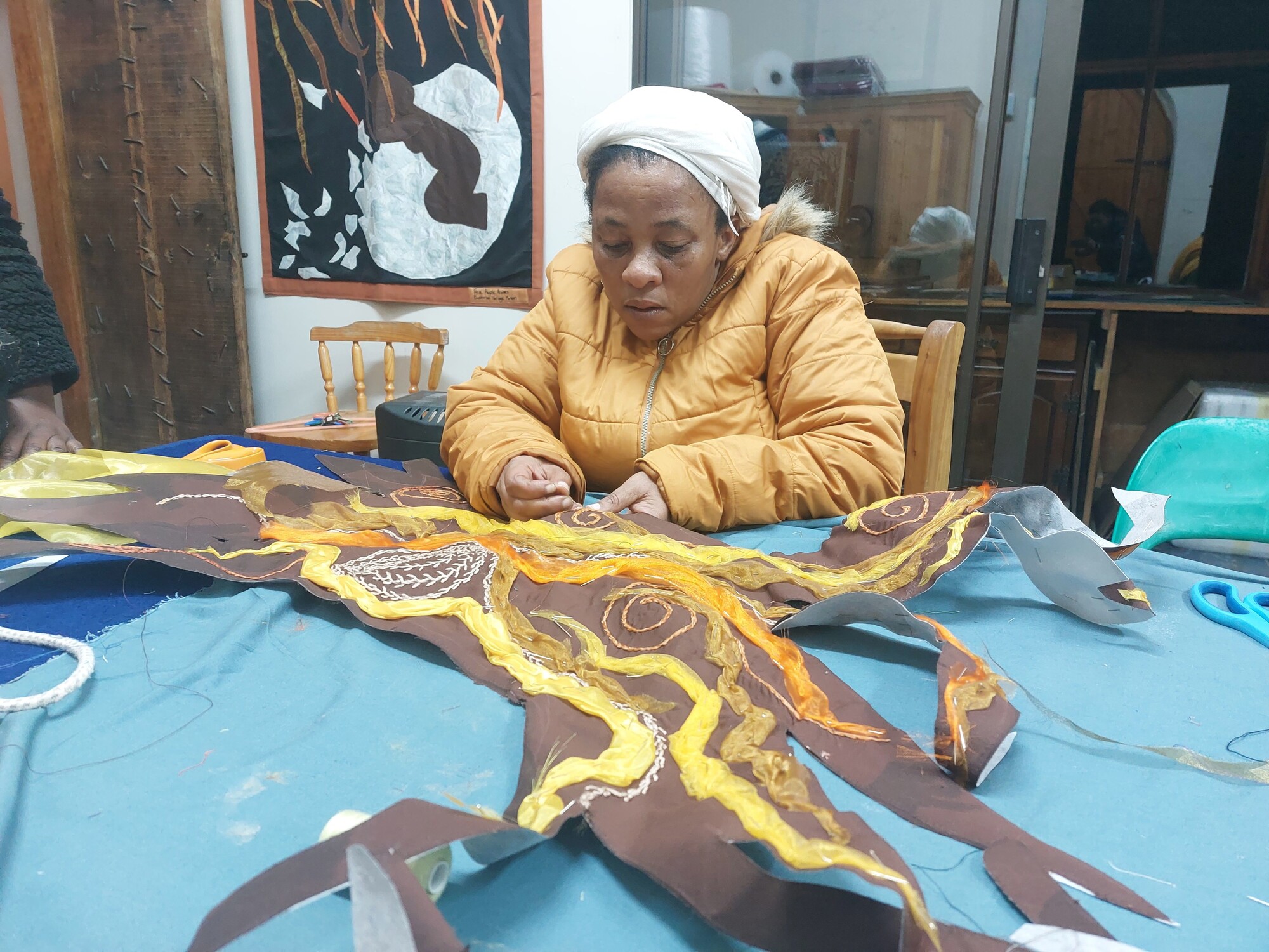 7 20230626 193917 Restorations in progress Sanda working on Truth tree tapestry