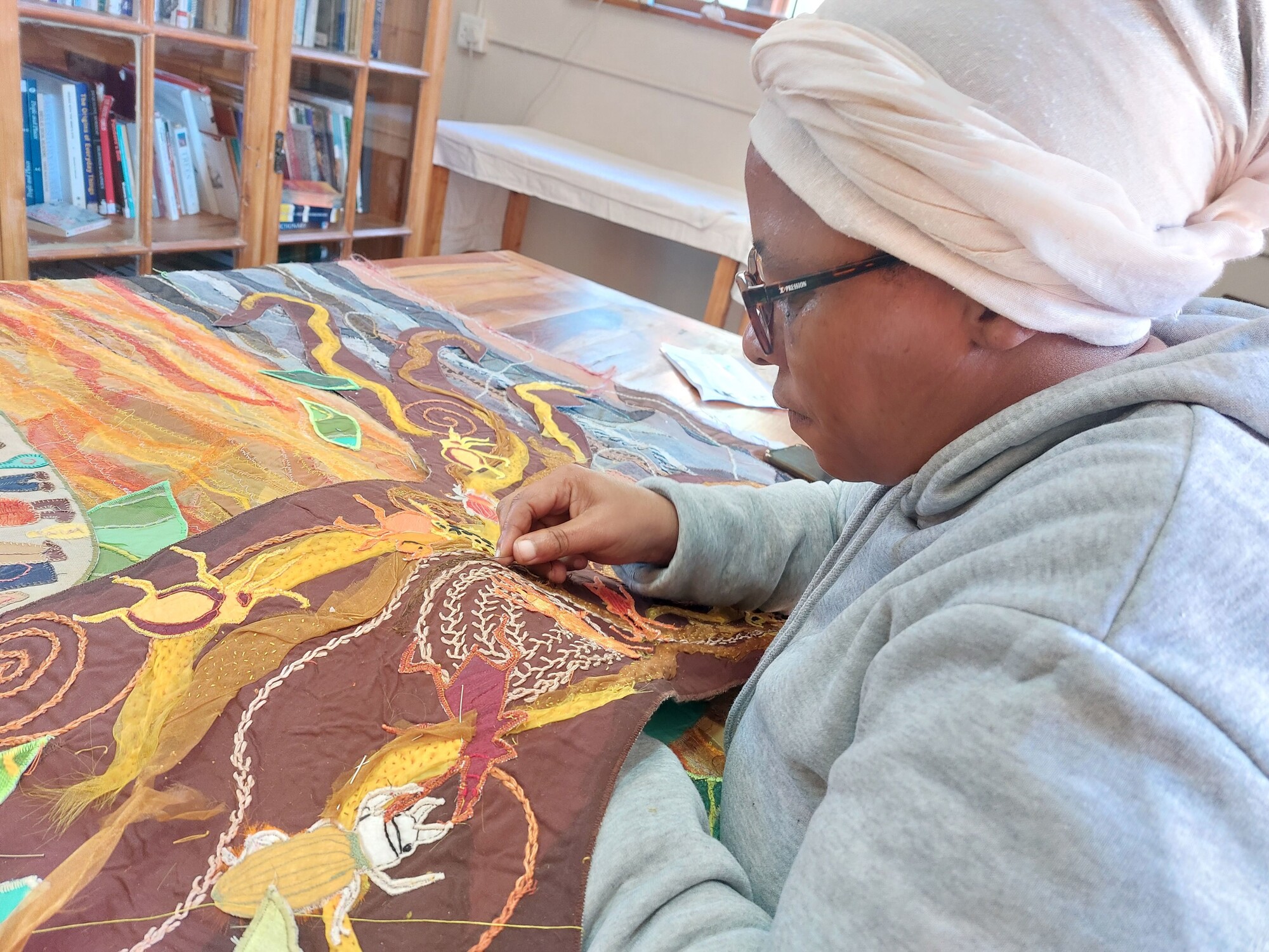 13 20230703 102913 Restorations in progress Sandra working on tree trunk